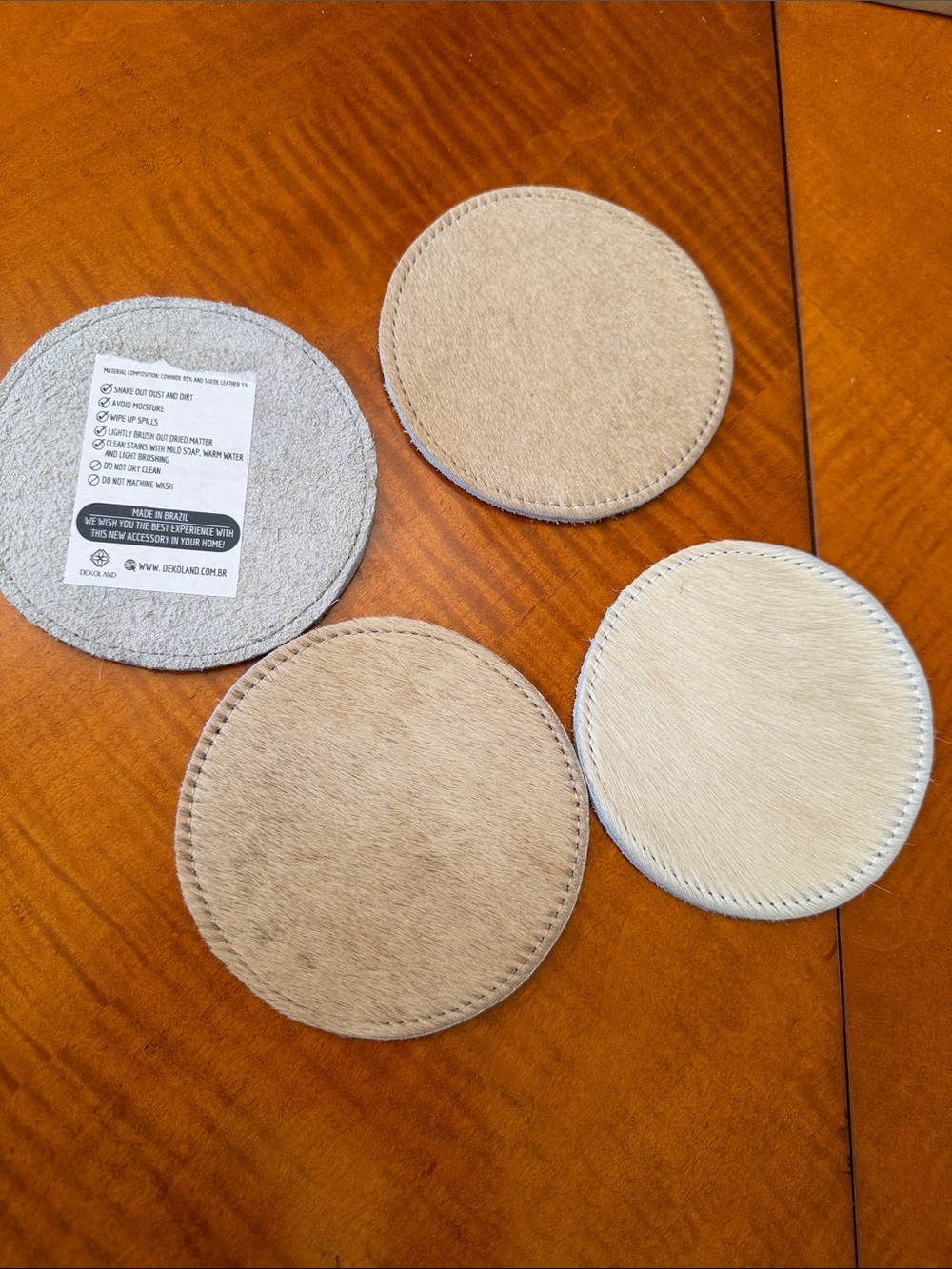 New set of 4 cow leather  coasters made in Brazil